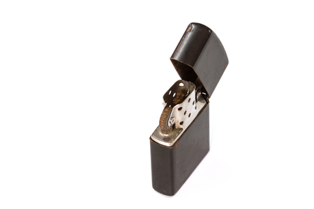 Old Cigarette lighter isolated on white background closeupの写真素材