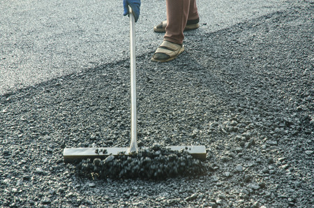 Workers on a road construction, Asphalt road construction 