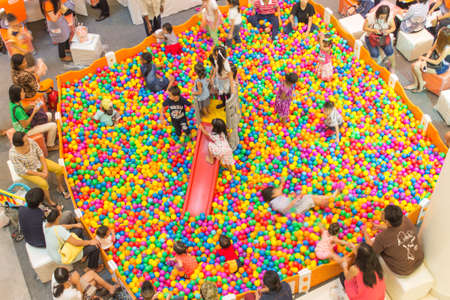 CHIANGMAI ,THAILAND - May 18, 2014 ; An elevated view of children playing on colorful  balls at Central Festival Chiang mai Department store North of THAILANDのeditorial素材