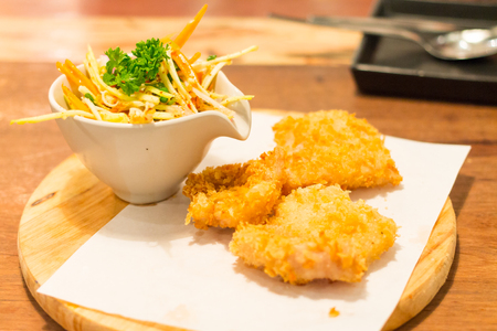 Mixed spicy salad and  fishの写真素材