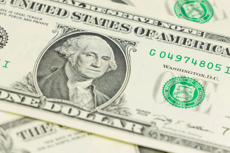 Close-up of one dollar on background