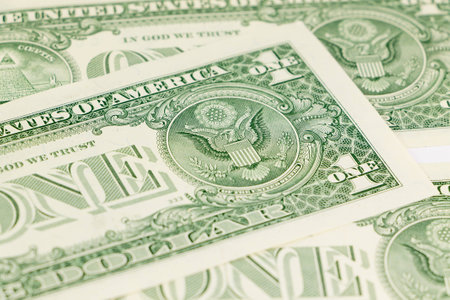 Close-up of one dollar on background