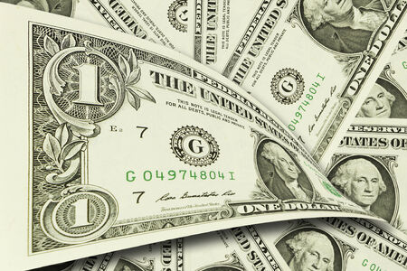 Close-up of one dollar on background