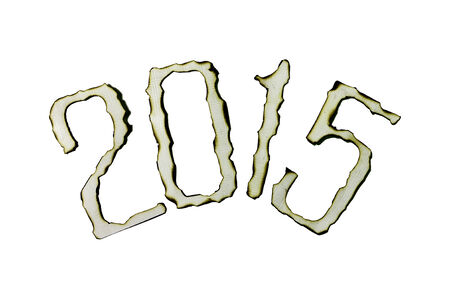 Burn the paper number 2015 isolated on white backgroundの写真素材