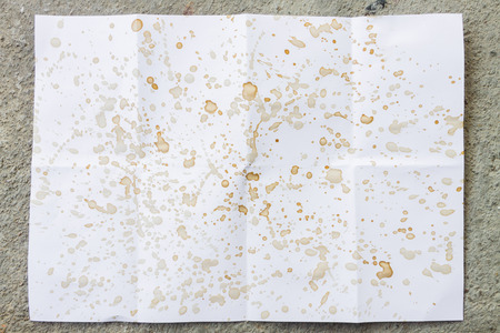 Sheet of the old paper with stain of coffeeの写真素材