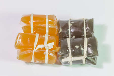 Thai caramel candy on white background