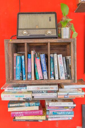CHIANG MAI, THAILAND - April 11 :2015 ,  Row of old books  inside The Wooden bookshelfis( DIY) is...