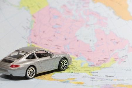 Closeup car (small) toys on paper map