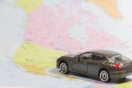 Closeup car (small) toys on paper map