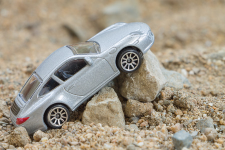 CHIANG MAI THAILAND  APRIL 25 2015: Car small toys Miniature representation of porsche on white background produced as children toysのeditorial素材