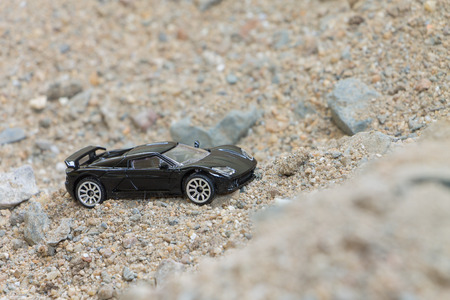 CHIANG MAI THAILAND  APRIL 25 2015: Car small toys Miniature representation of porsche on white...