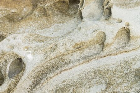 Close Up of rocky shore texture backgroundの写真素材