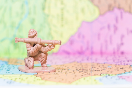 Toy Soldiers is an action and strategy on paper map backgroundの写真素材
