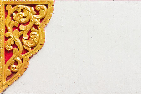 Thai style molding art on the white wallの写真素材