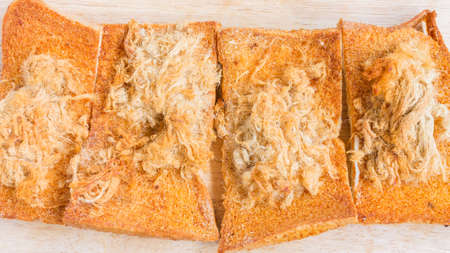 Dried shredded pork with Chillies sauce on Breadの写真素材