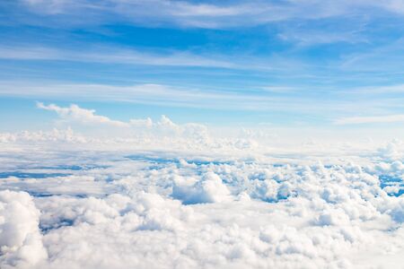 White fluffy clouds in the blue sky