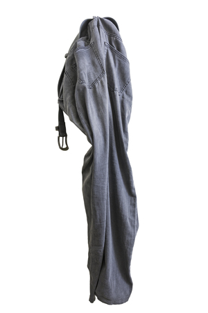 Isolated jeans hang on white backgroundの写真素材
