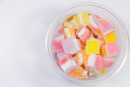 Colorful Gummy candy rainbow on white backgroundの写真素材