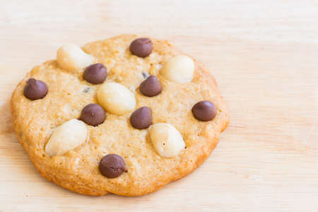 Homemade Cookies, Macadamia and Chocolate Chip on Wooden background
