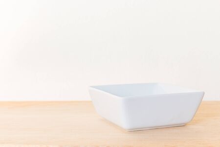 Empty Bowl on rustic wooden backgroundの写真素材