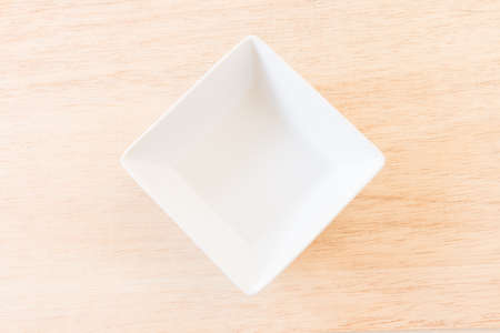 Empty Bowl on rustic wooden backgroundの写真素材