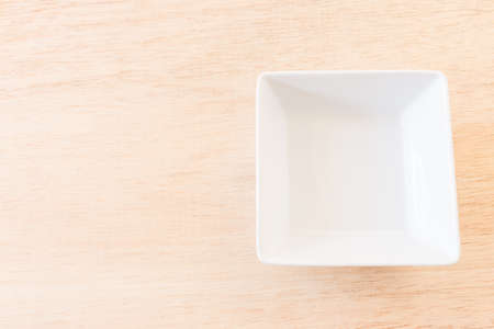 Empty Bowl on rustic wooden backgroundの写真素材
