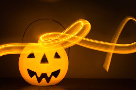 Scary Halloween background with pumpkins on blackの写真素材