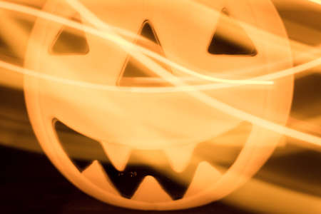Scary Halloween background with pumpkins on blackの写真素材