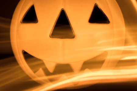 Scary Halloween background with pumpkins on blackの写真素材