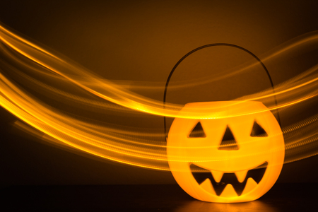 Scary Halloween background with pumpkins on blackの写真素材