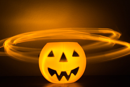 Scary Halloween background with pumpkins on blackの写真素材