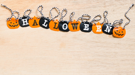 Halloween flags , black and orange flags on wooden backgroundの写真素材