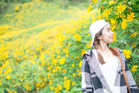 Portrait of a beautiful asian woman with nature backgroundの写真素材