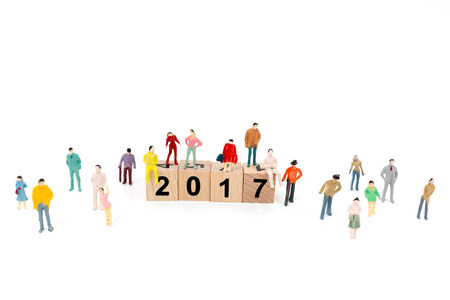 New year concept , Crowd of people with Wooden block Word 2017  on white backgroundの写真素材