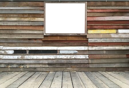 Wooden wall texture background  with white picture frameの写真素材