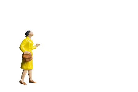 Miniature people isolated on white background with clipping pathの写真素材