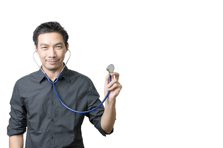 Asian man holding stethoscope isolated on white background with clipping pathの写真素材
