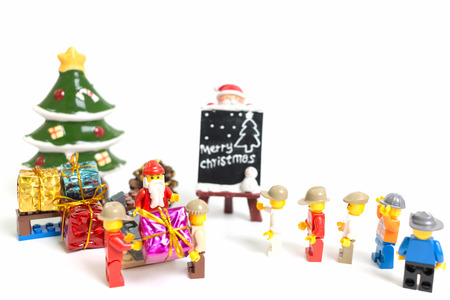 CHIANG MAI , THAILAND - September 5, 2017 Lego Santa Claus minifigure with Christmas tree depicting a festive , Christmas scene on white backgroundのeditorial素材
