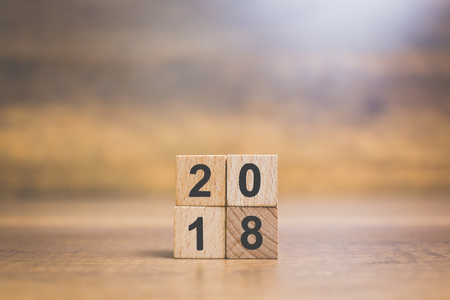 Wooden block number 2018 on wooden background