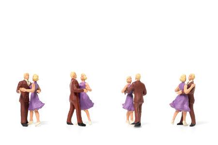 Miniature people, Couple romantic dancing on white backgroundの写真素材
