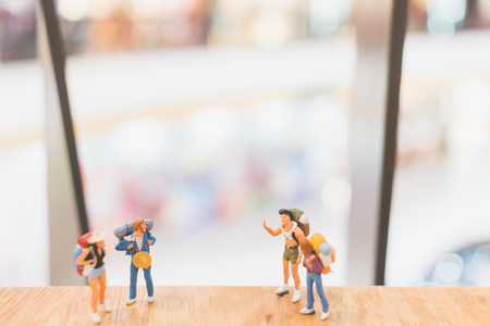Miniature people : Travellers walking on The bridge , Holiday and Travel conceptの写真素材