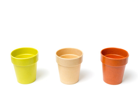 Recycled materials biodegradable tree pot isolated on a white backgroundの写真素材