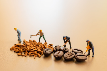 Miniature people : Teams work extremely well together on coffee blend process