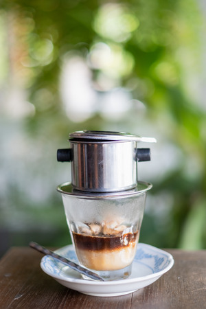 Affogato coffee with ice cream on a glass cup with natural backgroundの写真素材