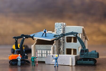 Miniature people : worker team for building home , Home renovating conceptの写真素材