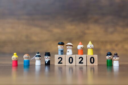 Miniature toy : Wooden doll with  wooden block number 2020の写真素材