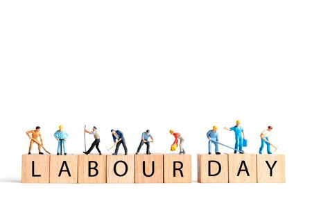 Miniature people ,worker team standing on white background and copy space for your text , Labour day conceptの写真素材