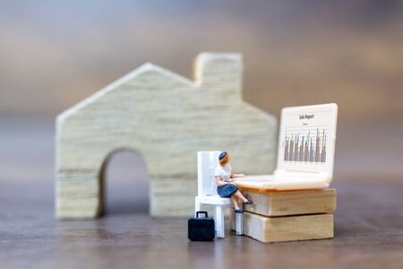 Miniature people working with computer labtop , Work at home concept