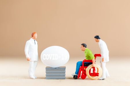 Miniature people , Doctor research and Development Coronavirus Vaccine , Medicine to stop outbreak Coronavirus COVID-19.の写真素材