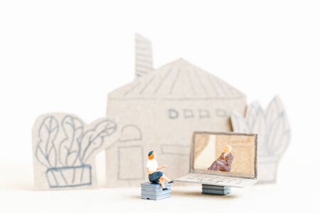 Miniature people working with computer labtop , Work at home concept